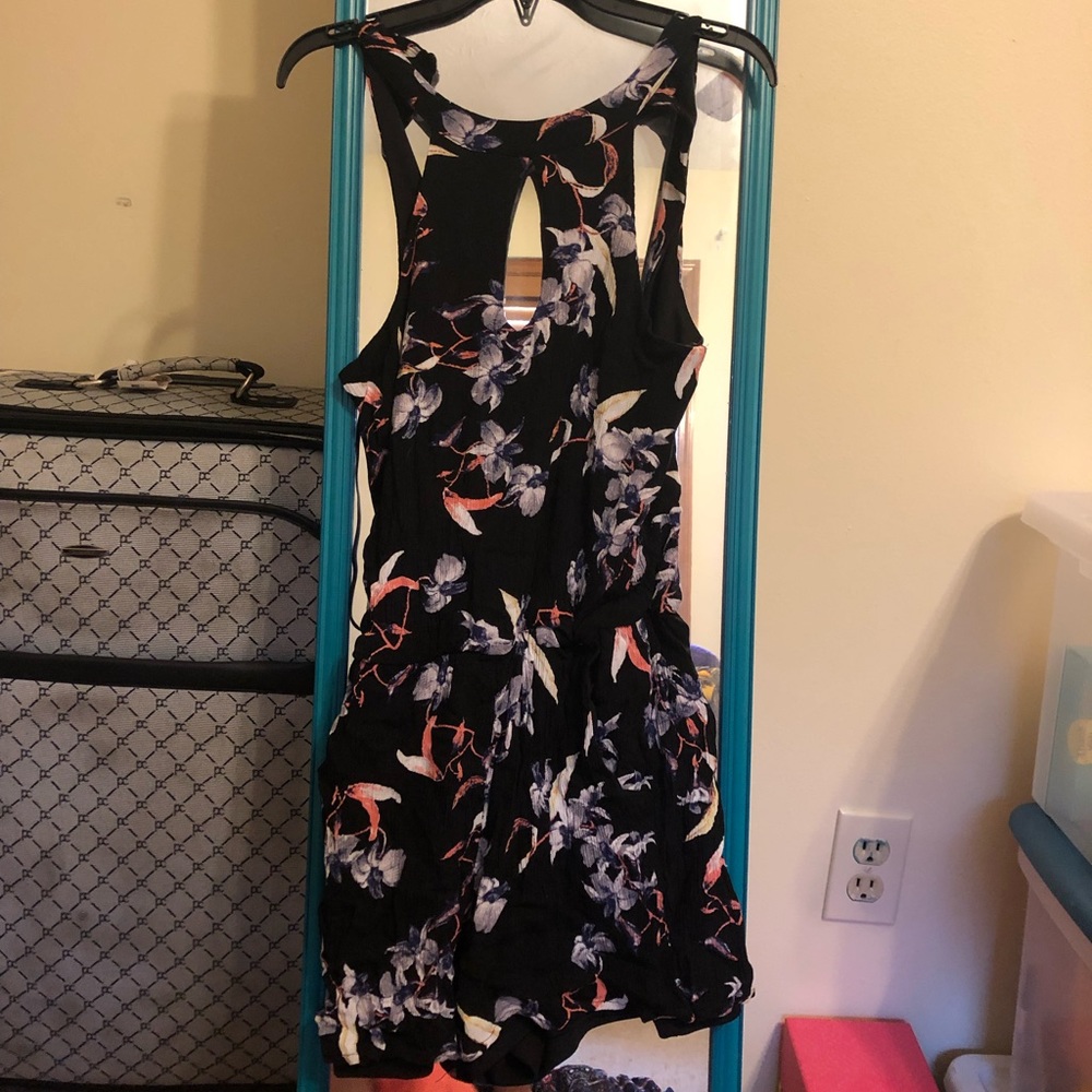 Small black and patterned romper